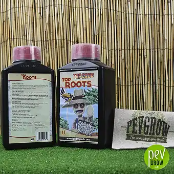 Top Roots by Top Crop , root stimulator in a black container together with its transparent measuring cap.